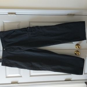 Wrangler cargo pants, black, two leg Velcro pockets.